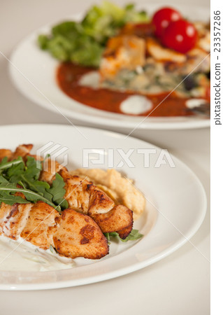 Grilled chicken skewers meal 23357286