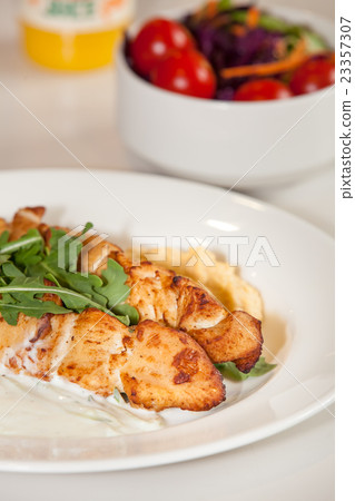 Grilled chicken skewers meal 23357307