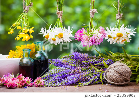 Bunch of healthy herbs, mortar, herbal medicine Bunch of healthy herbs, mortar, herbal medicine 23359902