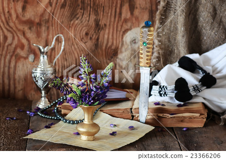 Arab book flower and knife Arab book flower and knife 23366206
