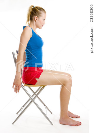 exercising woman sitting on chair exercising woman sitting on chair 23368306