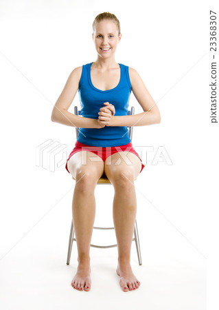 exercising woman sitting on chair exercising woman sitting on chair 23368307