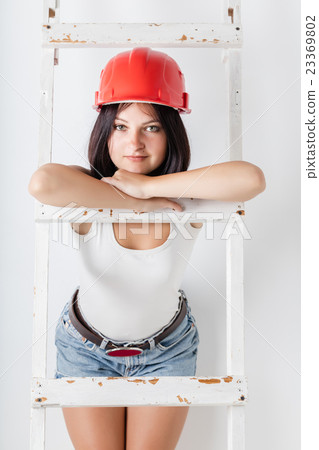 woman in the construction hardhat 23369802