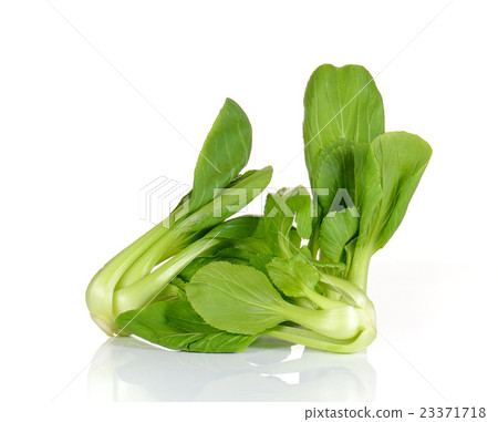Turnip greens on white background. 23371718