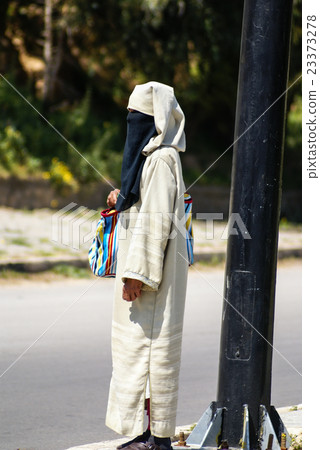 people walking on street of Fes, Morocco 23373278