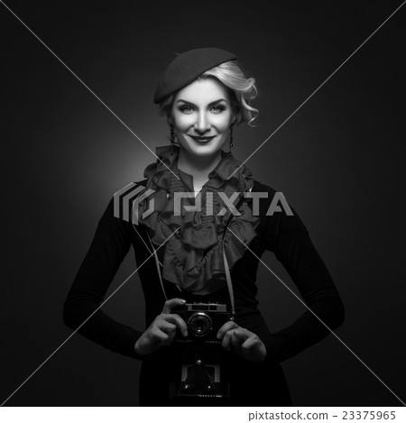 Beautiful lady with retro photo camera Beautiful lady with retro photo camera 23375965