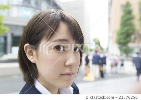 Business woman outside camera Looking up Gazing up Seriously stating Profile Marunouchi 23376256