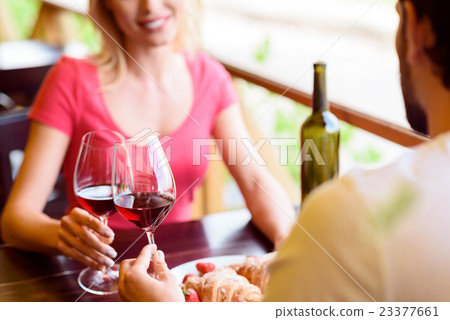 Young man and woman dating in cafe Young man and woman dating in cafe 23377661