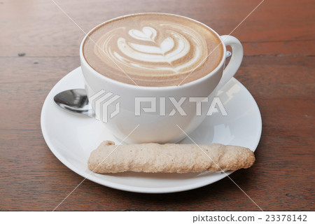 latte art coffee with heart pattern in a white cup 23378142