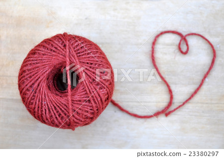 Red Rope Skein On Wood Table 23380297