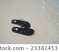 Sandy beach and beach sandals 23381453