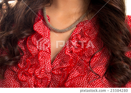 Necklace on young lady's neck. Necklace on young lady's neck. 23384280