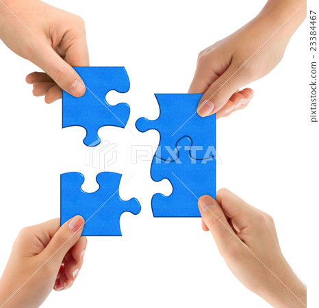 Hands and puzzle 23384467