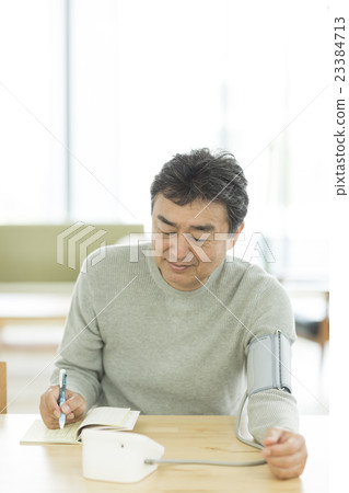 Senior male measuring blood pressure Senior male measuring blood pressure 23384713