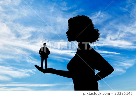 Silhouette feminist holding a small man. Silhouette feminist holding a small man. 23385145