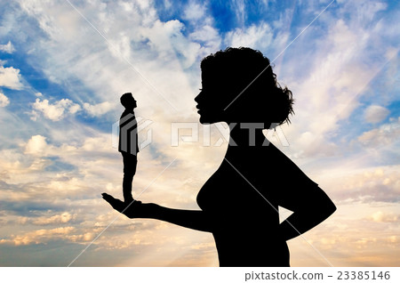 Silhouette feminist holding a small man. 23385146