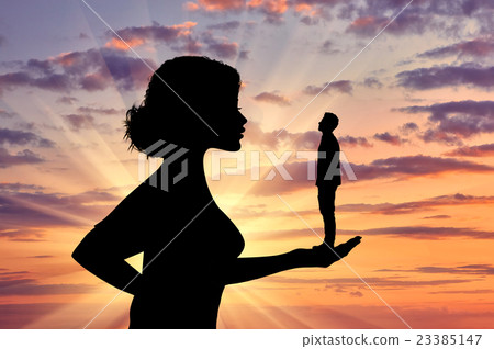Silhouette feminist holding a small man. Silhouette feminist holding a small man. 23385147