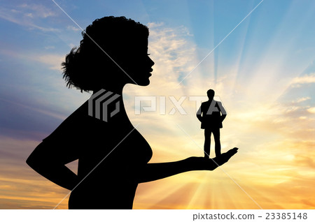 Silhouette feminist holding a small man. Silhouette feminist holding a small man. 23385148