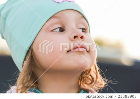 Closeup face portrait of funny cute baby girl Closeup face portrait of funny cute baby girl 23385905