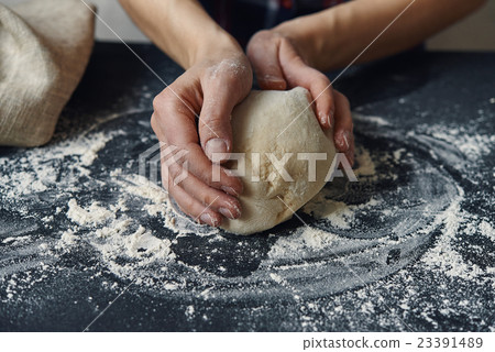 hands and dough 23391489