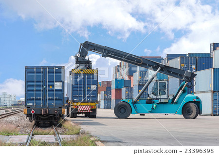 forklift handling container box loading to train 23396398