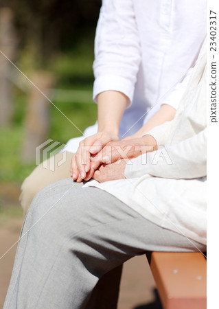 Senior female hand Senior female hand 23402317