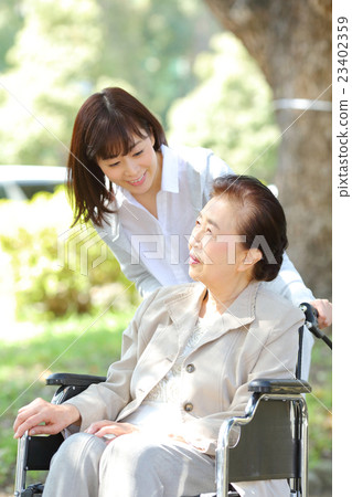 Stock Photo: senior, helper, Wheel Chair