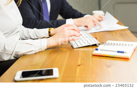 Working on the computer. Close-up of woman typing Working on the computer. Close-up of woman typing 23403132