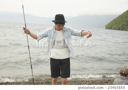 Family camp fishing 23403850