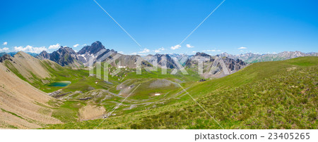 High altitude blue lake in idyllic environment High altitude blue lake in idyllic environment 23405265