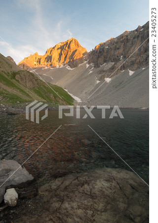 High altitude alpine lake in idyllic land 23405273