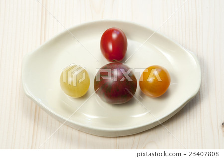 Four different tomatoes 23407808