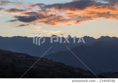 Mountain silhouettes during sunset 23409586