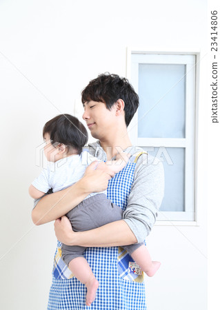 Child nurse holding a child Child nurse holding a child 23414806