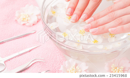 Woman hands in bath with water Woman hands in bath with water 23415968