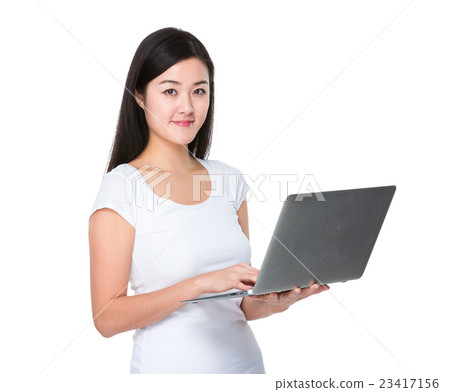Asian woman use of notebook computer Asian woman use of notebook computer 23417156