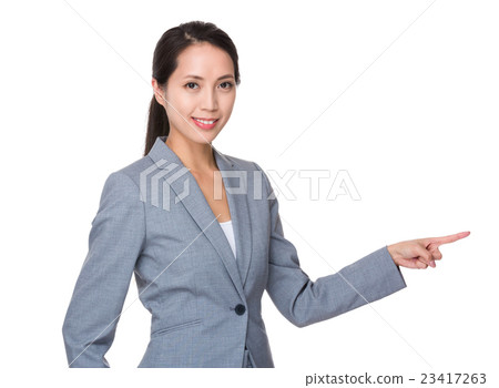 Asian Young Businesswoman with finger point aside 23417263