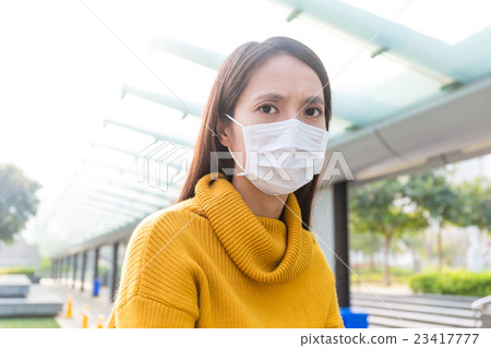 Asian woman wearing the face mask 23417777