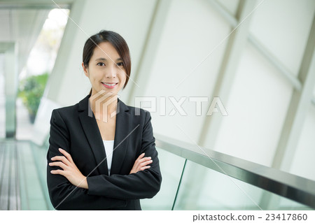 Businesswoman at office Businesswoman at office 23417860