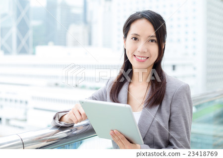 Business woman use of tablet pc Business woman use of tablet pc 23418769
