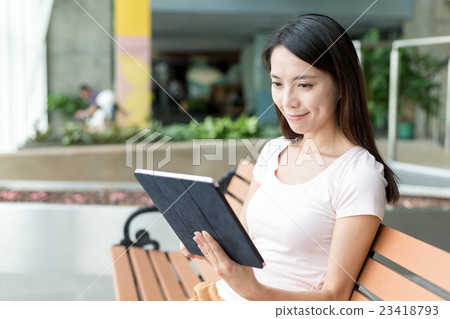 Woman use of digital tablet pc 23418793