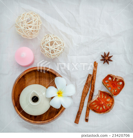 Frangipani flowers with herbal spa products . Frangipani flowers with herbal spa products . 23420706