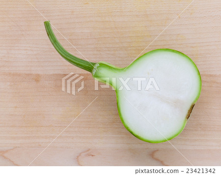 Halved bottle gourd or calabash gourd . Halved bottle gourd or calabash gourd . 23421342