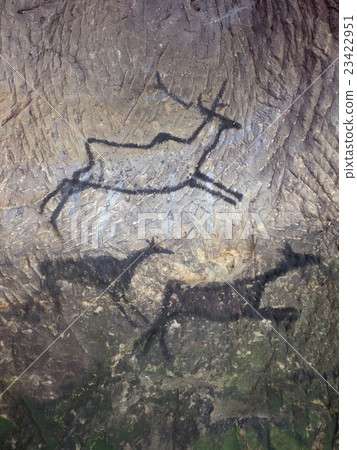 Black carbon paint of deer on sandstone wall 23422951