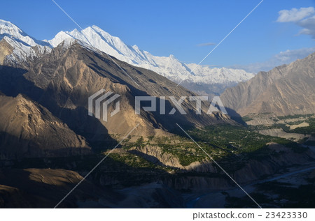 Hunza of Sunrise in Pakistan Hunza village and mountain bathed in the morning sun Hunza of Sunrise in Pakistan Hunza village and mountain bathed in the morning sun 23423330