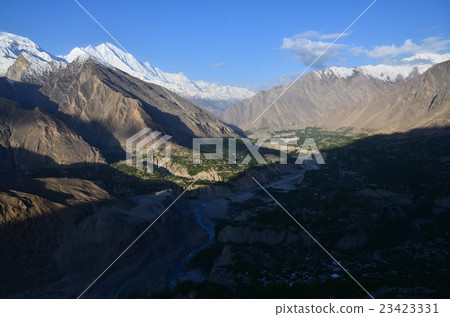 Hunza of Sunrise in Pakistan Hunza village and mountain bathed in the morning sun Hunza of Sunrise in Pakistan Hunza village and mountain bathed in the morning sun 23423331