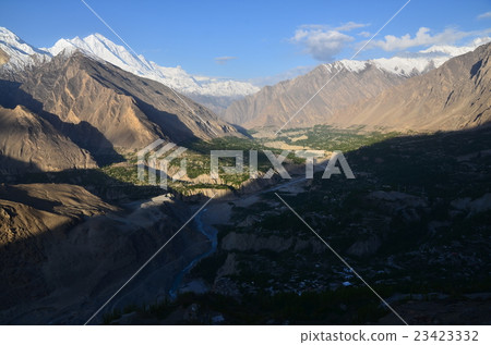 Hunza of Sunrise in Pakistan Hunza village and mountain bathed in the morning sun Hunza of Sunrise in Pakistan Hunza village and mountain bathed in the morning sun 23423332