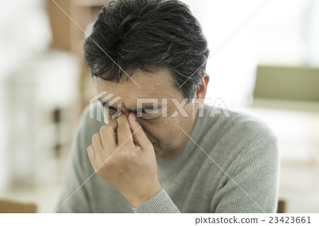Male holding the eyes 23423661