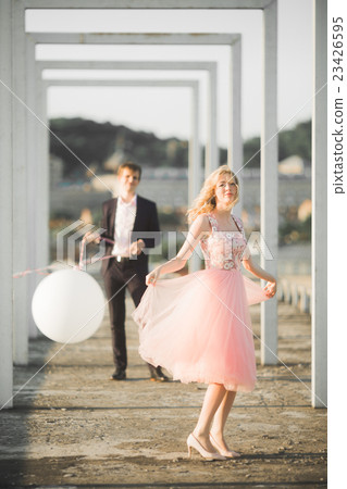 Lovers man and woman embracing each other outdoors Lovers man and woman embracing each other outdoors 23426595