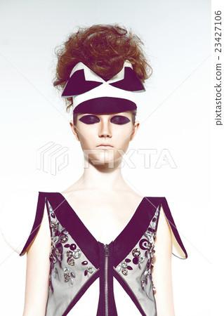 Girl in futuristic clothes Girl in futuristic clothes 23427106